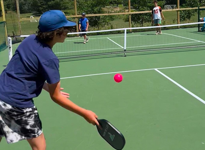 Campers participate in a game of pickleball at North Star Camp for Boys.