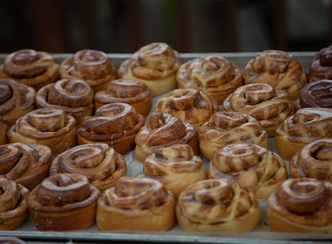 Homemade cinnamon rolls sit on a baking sheet at North Star Camp for Boys.