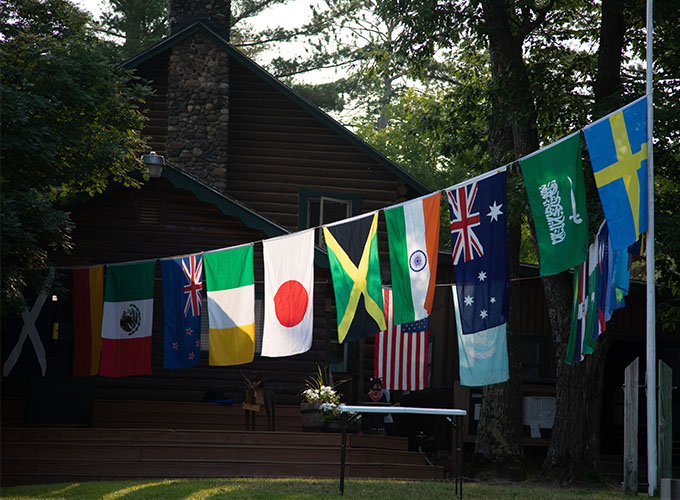 Image of international flags at North Star Camp for Boys.