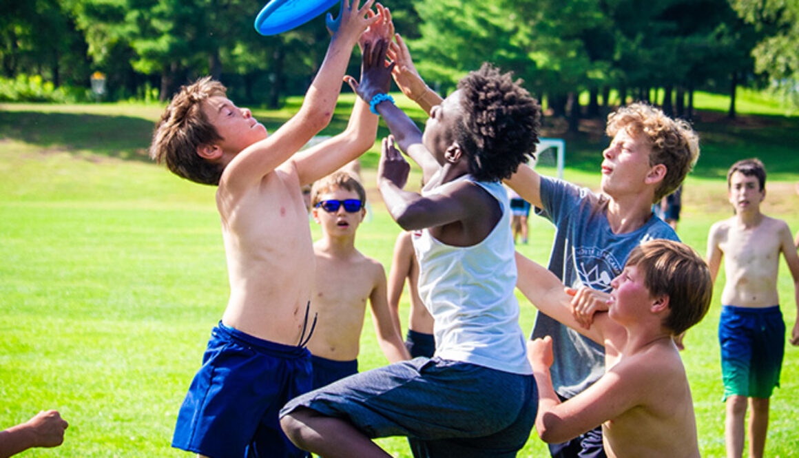 North Star Camp for Boys campers playing a competitive game of Ultimate Frisbee.