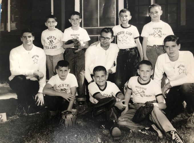 A group of campers and counselors from North Star Camp For Boys in 1957 outside of Cabin J2.
