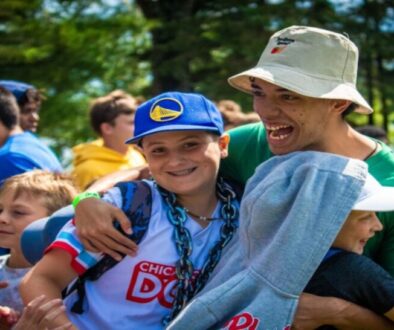 A counselor reunites with his former campers on the first day of camp at North Star Camp For Boys.