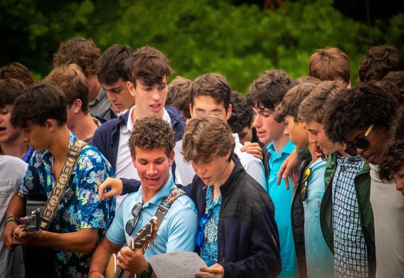 A group of campers sing a song during Visiting Weekend at North Star Camp.