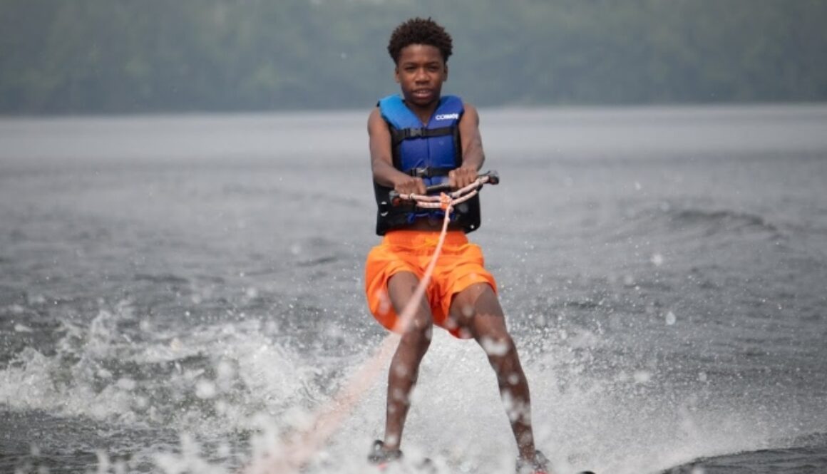 A North Star Camp camper goes waterskiing on Spider Lake.