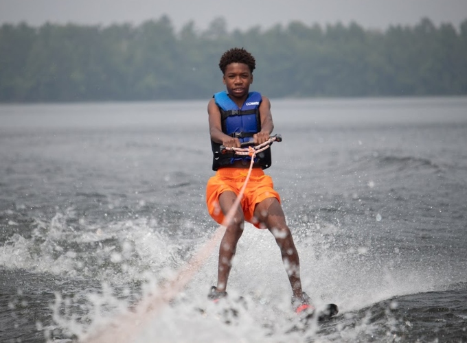 A North Star Camp camper goes waterskiing on Spider Lake.