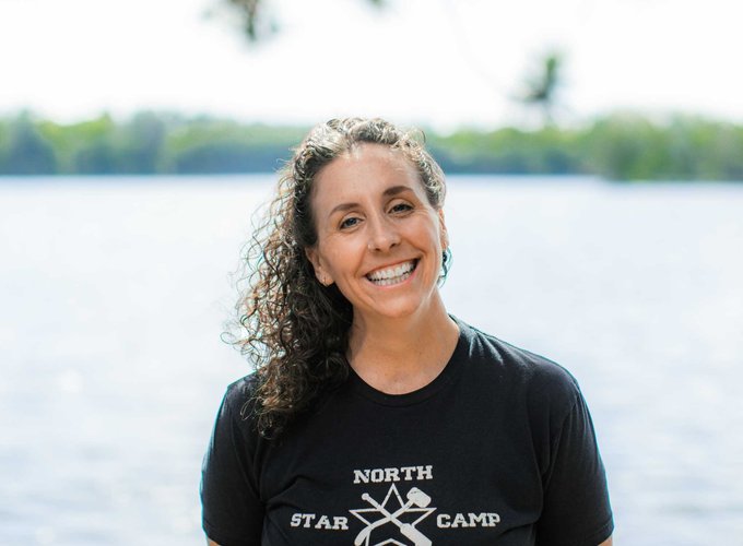 Assistant Director, Robyn Boehm, smiles for a headshot photo.